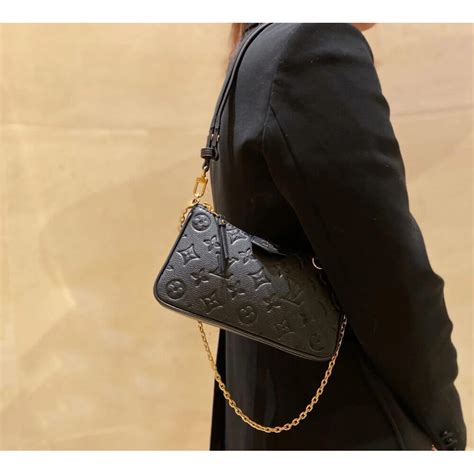 lv pouch with strap|louis vuitton easy pouch.